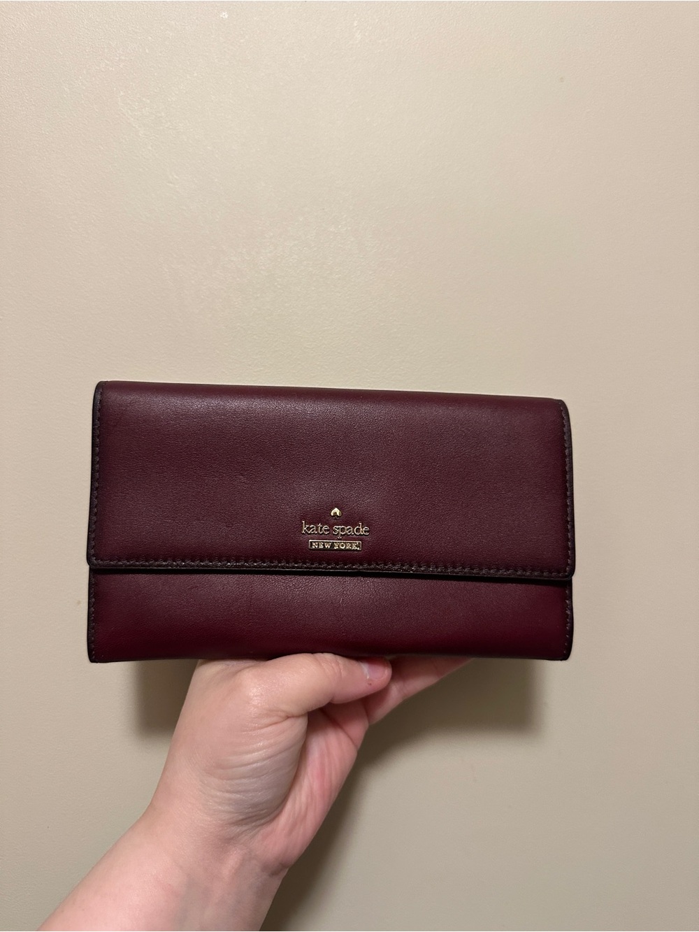 kate spade Bordeaux Leather Fold Wallet with Gold Logo